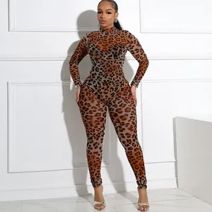 Detailed view of the sexy leopard print and sheer mesh fabric on the slim-fit jumpsuit.