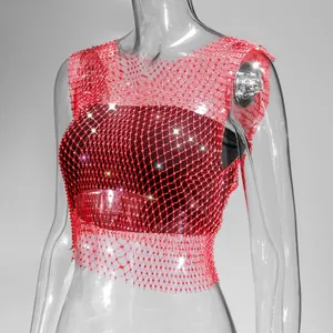 Close-up of red fishnet mesh vest decorated with sparkling rhinestones for night clubs