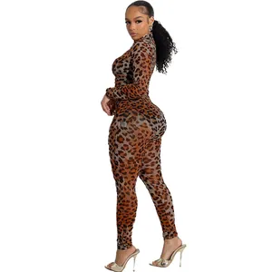 Full body side view of a sexy leopard print mesh long sleeve jumpsuit for women