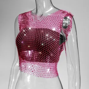Close-up of pink rhinestone fishnet crop top with sparkling diamond details for women