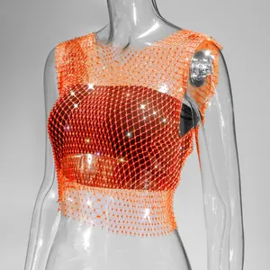 Detailed macro view of vibrant orange rhinestone fishnet top with shimmering crystals