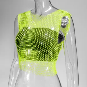 Close-up detail of neon green fishnet rhinestone tank top for sexy nightclub fashion wear
