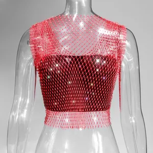 Close-up detail of sexy red fishnet tank top with sparkling rhinestones for night club wear