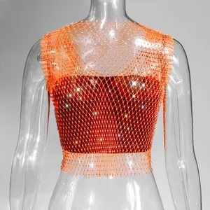 Detailed view of a sexy orange rhinestone mesh crop top with sparkling crystals for clubwear