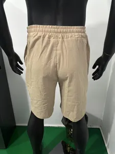 Detailed back view of men's breathable khaki linen casual beach shorts for summer vacation