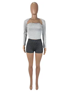 Full display of women's three-piece set with contrast polka dot print shrug and shorts