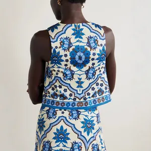 Detailed back view of a stylish blue and white floral sleeveless top and skirt set