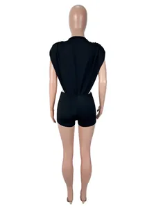 High-quality back view of a black sleeveless hollowed-out top and tight shorts set