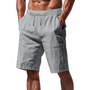 Detail view of men's breathable grey linen beach shorts with an adjustable drawstring waist