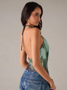 Side view detail of a sexy halter neck mesh tank top featuring a tie-back design