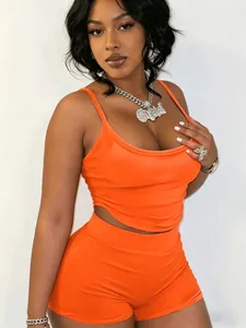 Sexy orange two-piece women's set featuring adjustable tank top and matching shorts