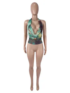 Detailed view of sexy halter cowl neck mesh top with green marble print texture