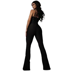 Rear view of sexy black backless jumpsuit with mesh detail and flared legs