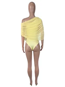 Back view of a sexy yellow one-shoulder pleated bodysuit with mesh overlay details.