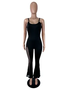 Sexy black spaghetti strap sleeveless jumpsuit with mesh side panels and flared legs.