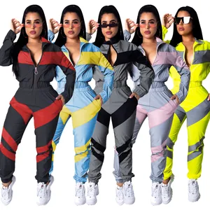 Color-blocked windbreaker jumpsuit with zipper detail in five vibrant color variations