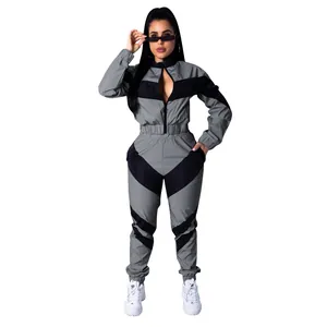 Professional women's grey and black color-blocked windbreaker tracksuit set with zipper jacket.