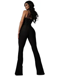 Elegant black backless jumpsuit with mesh details and flared legs for stylish women.