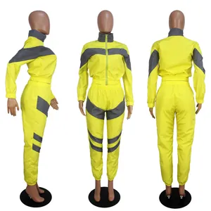 Two-tone yellow and grey windbreaker tracksuit set for women with long sleeve jacket