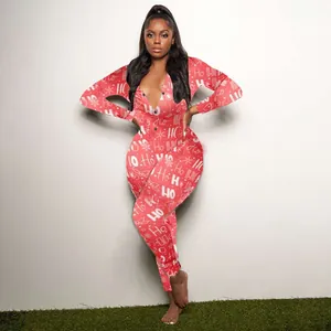 Close-up of Christmas pattern jumpsuit with HO HO HO print and deep V-neck