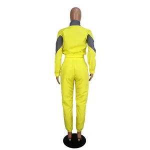 Detailed back view of yellow and gray two-tone long sleeve windbreaker tracksuit set