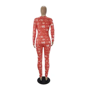 Detailed back view of a red Christmas jumpsuit featuring a festive HO HO HO print