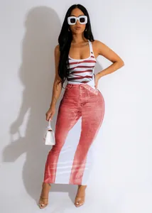 Full-length detail of a sexy U-neck vest dress with denim print and striped patterns.