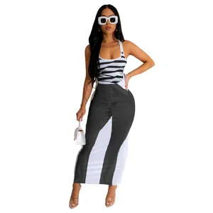 Fashionable sexy U-neck sleeveless dress featuring zebra stripes and denim print maxi skirt