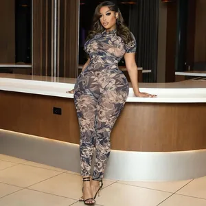 Sexy see-through mesh jumpsuit featuring vintage floral prints and bodycon fit in lounge