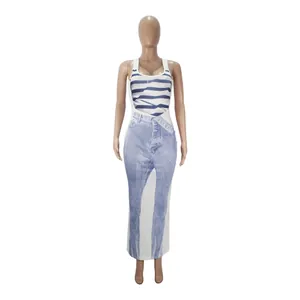 Detail showing the slim-fit dress with a unique denim print and classic U-neckline
