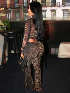 Back view of leopard print long-sleeve crop top and high-waist flared pants set