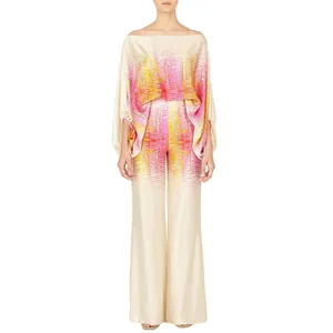 Elegant women's satin two-piece set featuring vibrant pink and yellow digital print