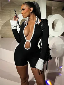 Tuta aderente sexy da donna con colletto a risvolto e design a contrasto bianco e nero