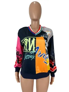 Sudadera holgada con cuello en V con llamativo patchwork de colores y estampados gráficos