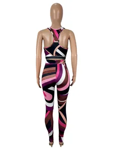 Rear view of women's two-piece sportswear set with colorful geometric swirl pattern print