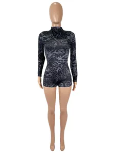 Full front view of a dark grey leopard print long sleeve bodycon romper on a mannequin.