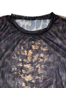 Detailed close-up showing the round neckline and sheer leopard print mesh fabric texture.