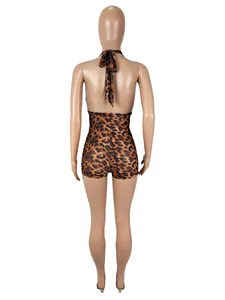 Back view of a sexy leopard print halter neck backless bodysuit shown on a mannequin.
