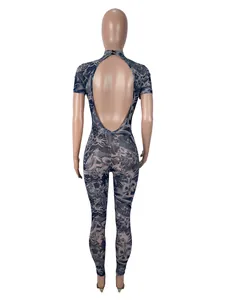 Detailed back view of a sexy backless mesh jumpsuit with dragon floral print.