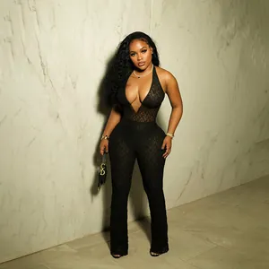 Elegant black lace halter jumpsuit with deep V-neck and open back design for women.