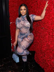 Sexy women's sheer mesh jumpsuit featuring a bold graphic print and form-fitting style