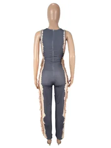 Detailed back view of sleeveless grey and nude color-block jumpsuit with side fringe