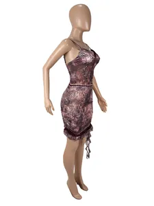 Professional side view of two-piece sexy mesh printed set with lace trim on a mannequin