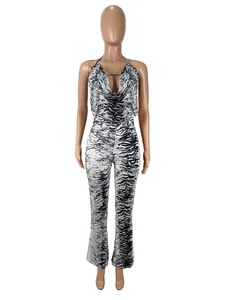 Ensemble sexy deux pièces haut dos nu et pantalon évasé à imprimé zèbre en maille