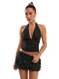 Sexy black and white polka dot halter top and tiered ruffle mini skirt two-piece set