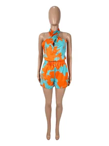 Set sexy due pezzi con top all'americana e pantaloncini con stampa astratta arancio