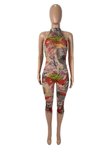 Sexy women's mesh bodycon jumpsuit featuring vibrant floral and dragon prints on mannequin