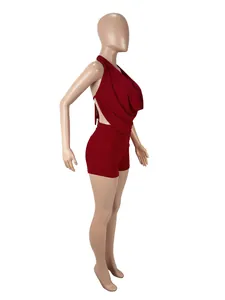 Side view of sexy burgundy cowl neck halter top and matching shorts on a mannequin