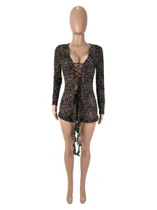 Detailed front view of a sexy leopard print mesh lace-up long sleeve bodysuit