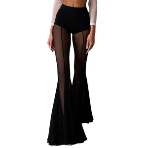 Detailed view of black mesh flare pants with sheer paneling and a sexy high-waisted fit